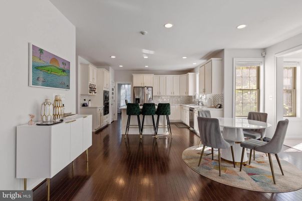 Dining room, Interior, Kitchen, Recessed Lighting, Stainless Steel Appliances, Wood Texture Flooring