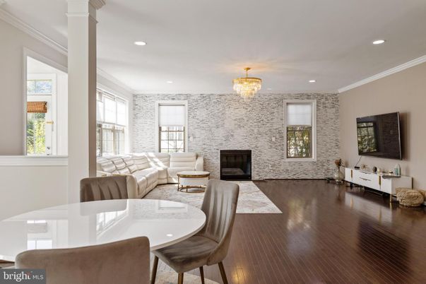 Chandelier, Dining room, Fireplace, Interior, Living room, Recessed Lighting, Wood Texture Flooring