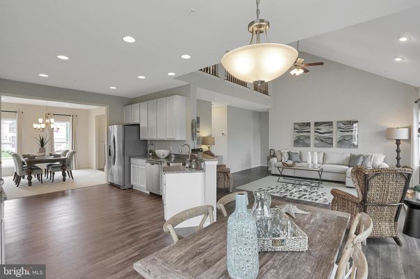 Chandelier, Dining room, Interior, Kitchen, Living room, Pendant Lights, Recessed Lighting, Stainless Steel Appliances, Wood Texture Flooring