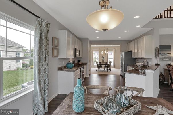 Chandelier, Dining room, Interior, Kitchen, Recessed Lighting, Stainless Steel Appliances, Wood Texture Flooring