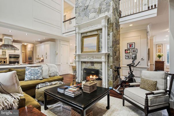 Fireplace, Fitness Equipment, Interior, Kitchen, Living room, Recessed Lighting, Stone Walls, Wood Texture Flooring
