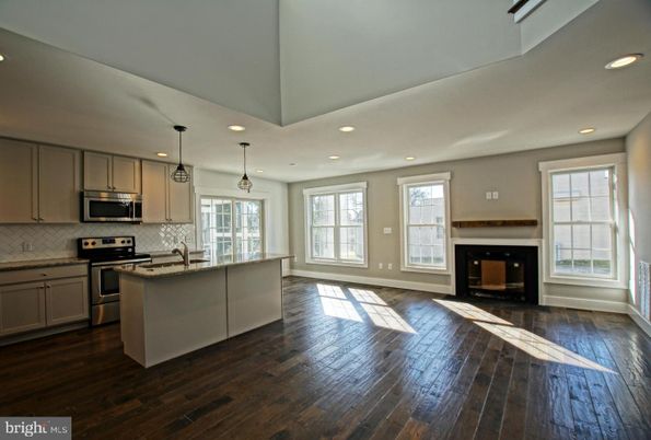 Fireplace, Interior, Kitchen, Pendant Lights, Recessed Lighting, Stainless Steel Appliances, Wood Texture Flooring