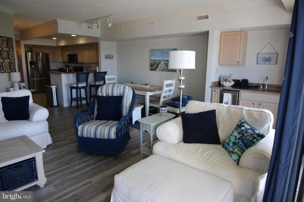 Dining room, Interior, Kitchen, Living room, Recessed Lighting, Stainless Steel Appliances, Wood Texture Flooring