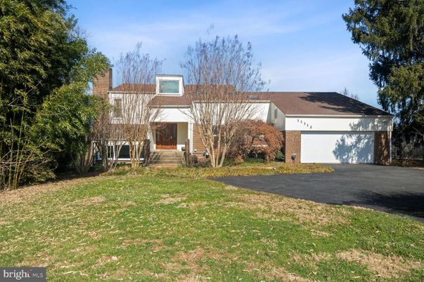 Attached, Backyard, Exterior, Facade, Brick Facade, Cape Cod