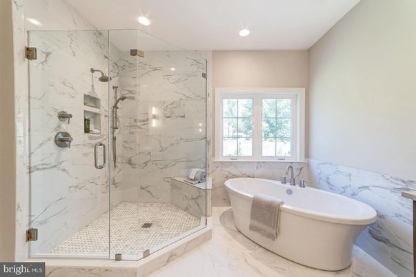 Bathroom, Free Standing Baths, Glass Shower, Interior, Marble, Marble Walls, Recessed Lighting