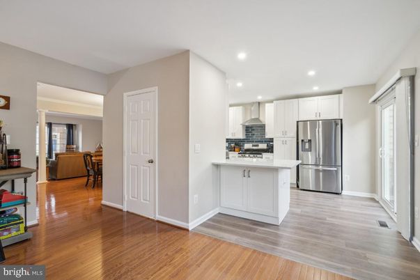 Dining room, Interior, Kitchen, Recessed Lighting, Stainless Steel Appliances, Wood Texture Flooring