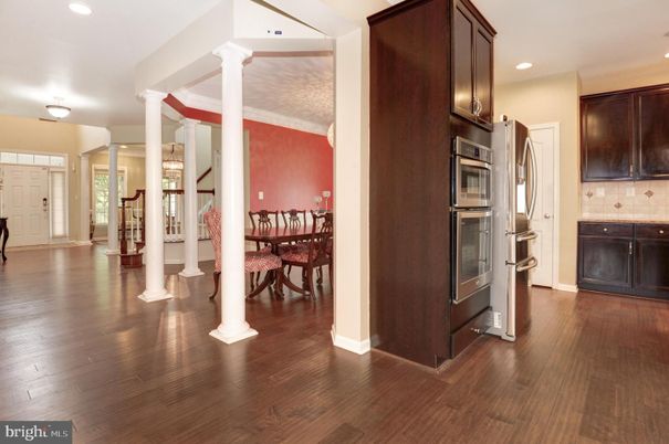 Dining room, Interior, Kitchen, Recessed Lighting, Stainless Steel Appliances, Wood Texture Flooring