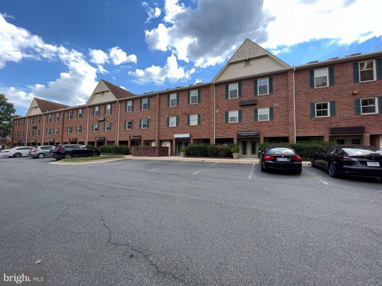 Exterior, Facade, Brick Facade, Condo Building