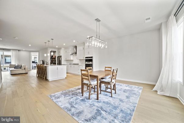 Dining room, Interior, Kitchen, Living room, Pendant Lights, Recessed Lighting, Stainless Steel Appliances, Wood Texture Flooring