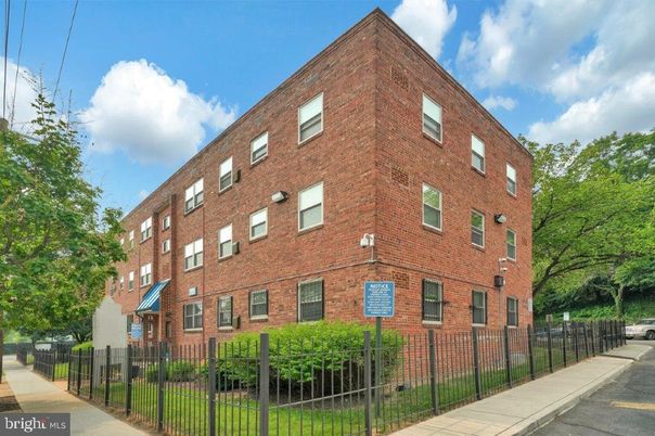 Exterior, Facade, Brick Facade, Condo Building