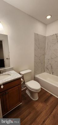 Bathroom, Interior, Marble Walls, Recessed Lighting, Wood Texture Flooring