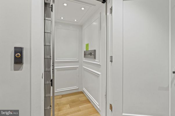 Elevator, Interior, Recessed Lighting, Wood Texture Flooring