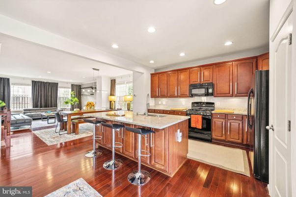 Dining room, Interior, Kitchen, Living room, Pendant Lights, Recessed Lighting, Stainless Steel Appliances, Wood Texture Flooring