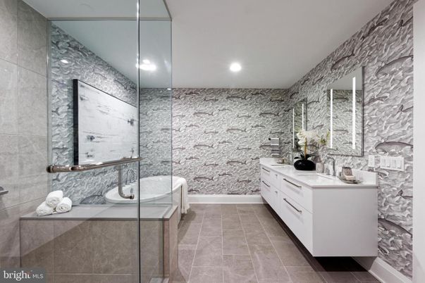 Bathroom, Dual Sink Vanities, Glass Shower, Interior, Recessed Lighting, Stone Walls