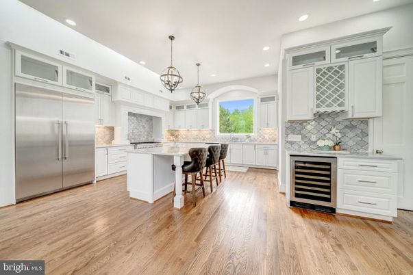 Chandelier, Interior, Kitchen, Pendant Lights, Recessed Lighting, Stainless Steel Appliances, Wood Texture Flooring