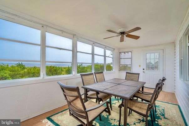 Dining room, Interior, Sun Room, Water, Wood Texture Flooring