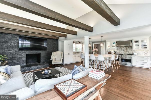 Fireplace, Interior, Kitchen, Living room, Pendant Lights, Stainless Steel Appliances, Stone Walls, Wooden Beams, Wood Texture Flooring