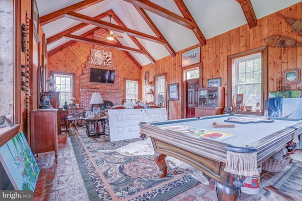 Billiard Table, Fireplace, Game Room, Interior, Stone Walls, Wooden Beams, Wooden Walls