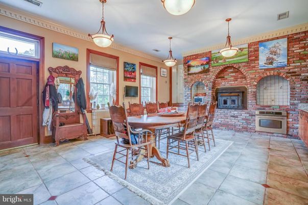 Dining room, Fireplace, Interior, Pendant Lights, Stone Walls