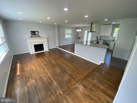 Empty room, Fireplace, Interior, Kitchen, Pendant Lights, Recessed Lighting, Wood Texture Flooring