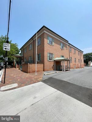 Exterior, Facade, Brick Facade, Condo Building
