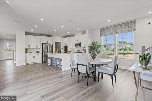 Dining room, Interior, Kitchen, Recessed Lighting, Stainless Steel Appliances, Wood Texture Flooring