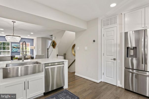 Chandelier, Interior, Kitchen, Pendant Lights, Recessed Lighting, Stainless Steel Appliances, Wood Texture Flooring