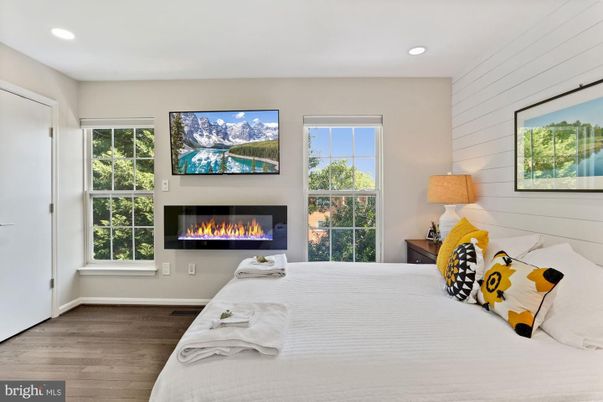 Bedroom, Fireplace, Interior, Recessed Lighting, Wood Texture Flooring