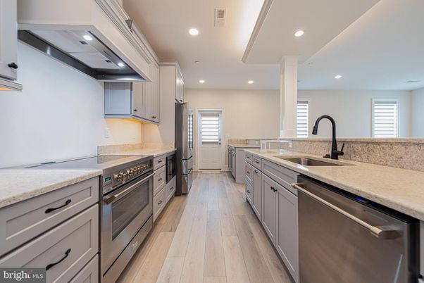 Interior, Kitchen, Recessed Lighting, Stainless Steel Appliances, Wood Texture Flooring