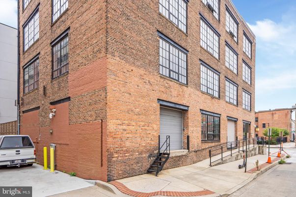 Exterior, Facade, Brick Facade, Condo Building