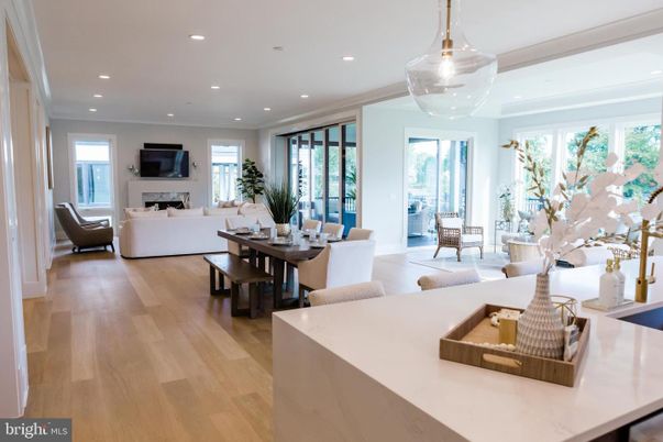 Dining room, Fireplace, Interior, Living room, Pendant Lights, Recessed Lighting, Wood Texture Flooring