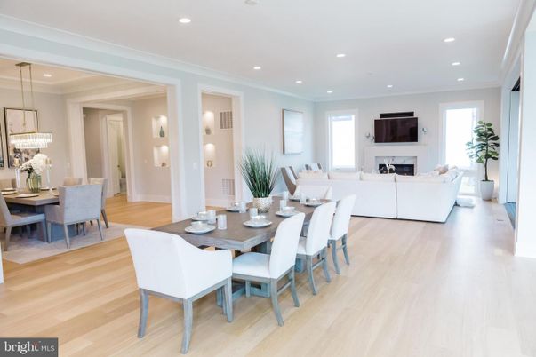 Dining room, Fireplace, Interior, Living room, Pendant Lights, Recessed Lighting, Wood Texture Flooring