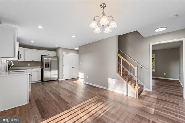 Chandelier, Interior, Kitchen, Recessed Lighting, Stainless Steel Appliances, Wood Texture Flooring