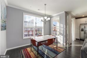 Chandelier, Dining room, Interior, Kitchen, Recessed Lighting, Stainless Steel Appliances, Wood Texture Flooring
