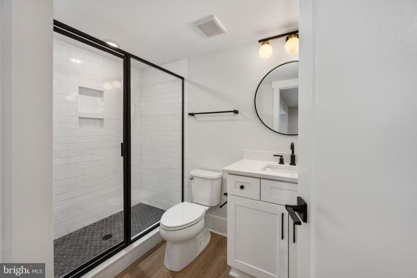Bathroom, Glass Shower, Interior, Recessed Lighting, Wood Texture Flooring