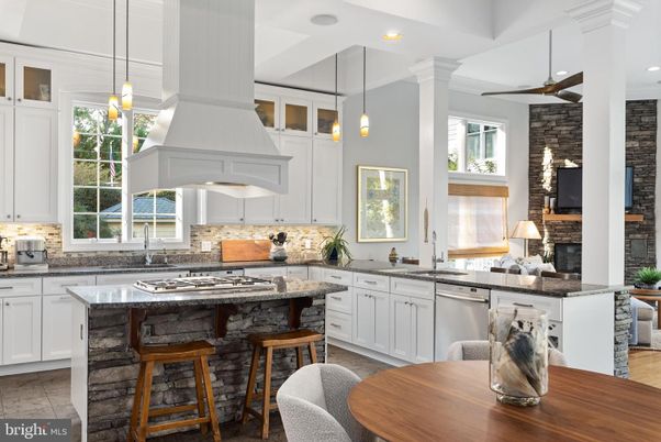 Fireplace, Interior, Kitchen, Pendant Lights, Recessed Lighting, Stainless Steel Appliances, Stone Walls