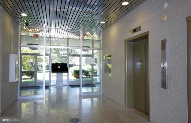 Elevator, Interior, Recessed Lighting, Stone Walls