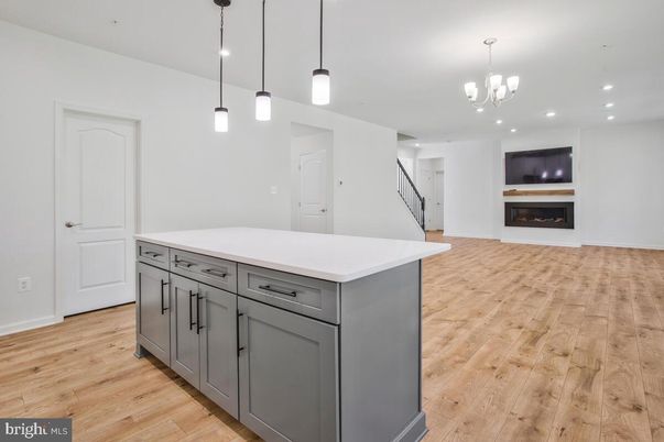 Fireplace, Interior, Pendant Lights, Recessed Lighting, Wood Texture Flooring