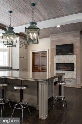 Fireplace, Interior, Pendant Lights, Recessed Lighting, Wooden Ceilings, Wood Texture Flooring