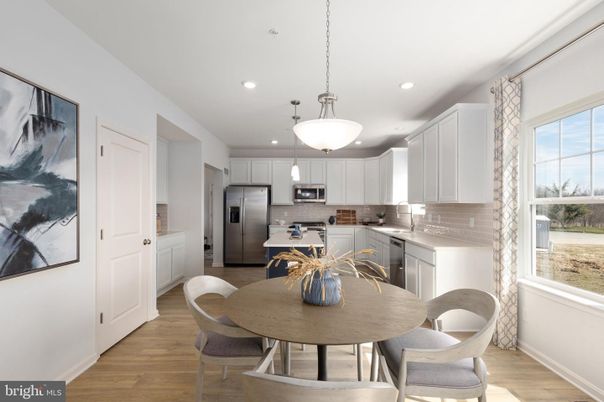 Dining room, Interior, Kitchen, Pendant Lights, Recessed Lighting, Stainless Steel Appliances, Wood Texture Flooring