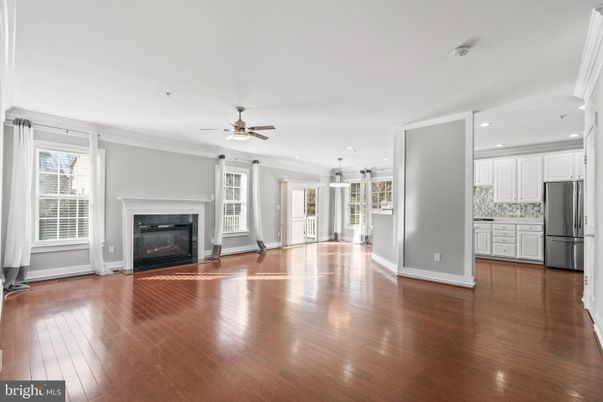 Empty room, Fireplace, Interior, Kitchen, Pendant Lights, Recessed Lighting, Wood Texture Flooring