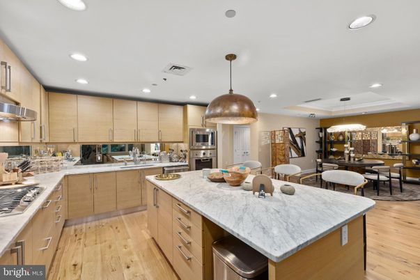 Chandelier, Dining room, Interior, Kitchen, Pendant Lights, Recessed Lighting, Stainless Steel Appliances, Wood Texture Flooring