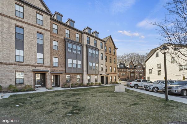 Backyard, Exterior, Facade, Brick Facade, Condo Building