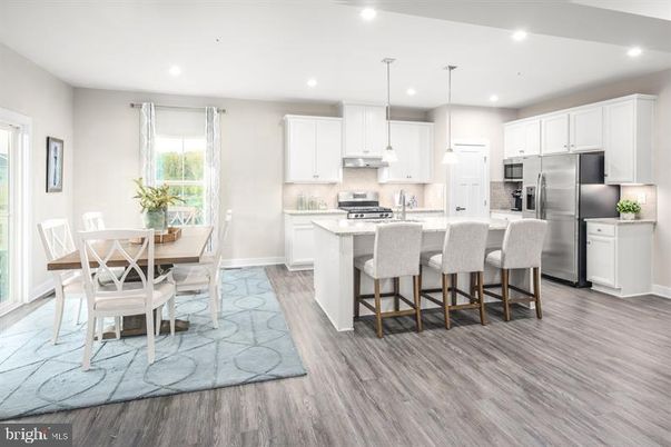 Dining room, Interior, Kitchen, Pendant Lights, Recessed Lighting, Stainless Steel Appliances, Wood Texture Flooring