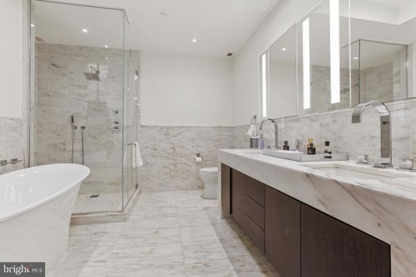 Bathroom, Dual Sink Vanities, Free Standing Baths, Glass Shower, Interior, Marble, Marble Walls, Recessed Lighting