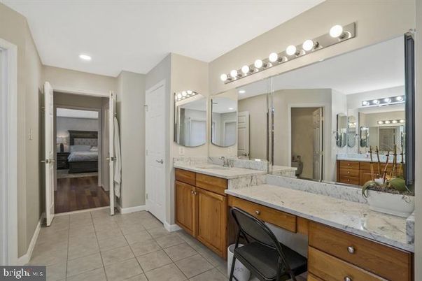 Bathroom, Bedroom, Dual Sink Vanities, Interior, Recessed Lighting, Wood Texture Flooring