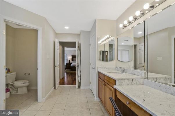 Bathroom, Dual Sink Vanities, Interior, Recessed Lighting, Wood Texture Flooring