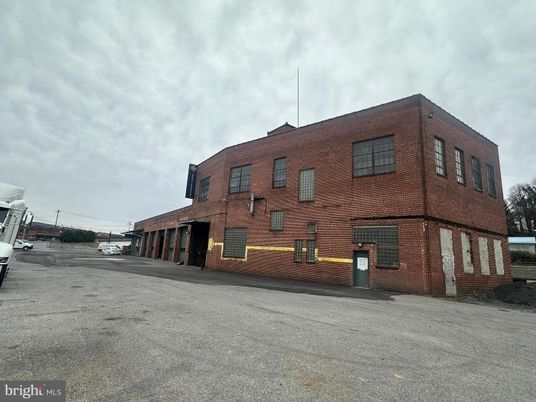 Exterior, Facade, Brick Facade, Condo Building
