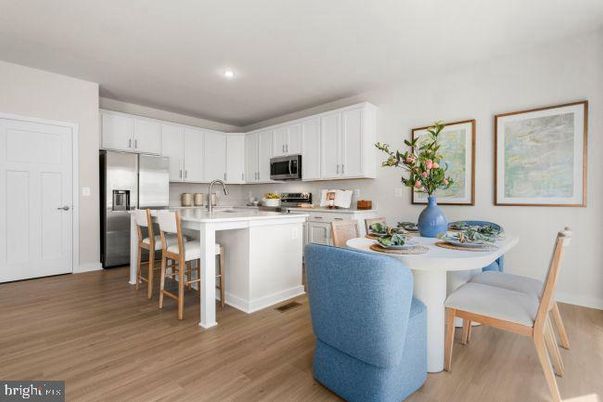 Dining room, Interior, Kitchen, Recessed Lighting, Stainless Steel Appliances, Wood Texture Flooring