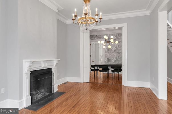 Chandelier, Dining room, Fireplace, Interior, Pendant Lights, Wood Texture Flooring